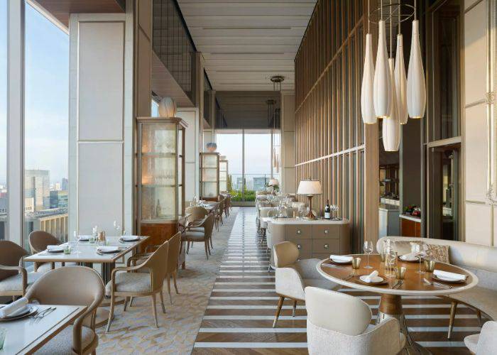 The bright, airy dining areas of the Four Seasons Hotel Tokyo at Otemachi.